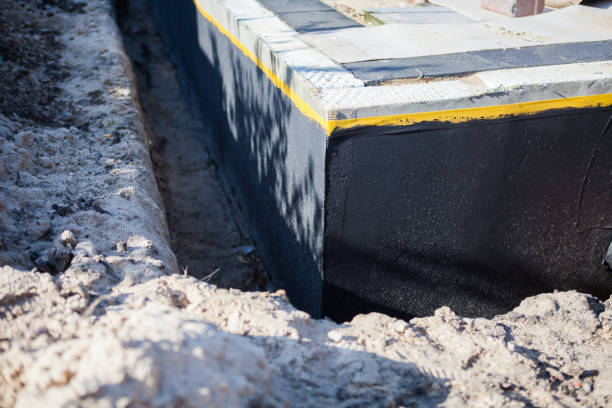 Professional Wet Basement Repair technician working in Corfu, NY